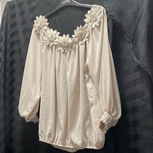 Cream blouse with flower neck line